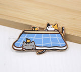 comfy kitty kotatsu enamel pin