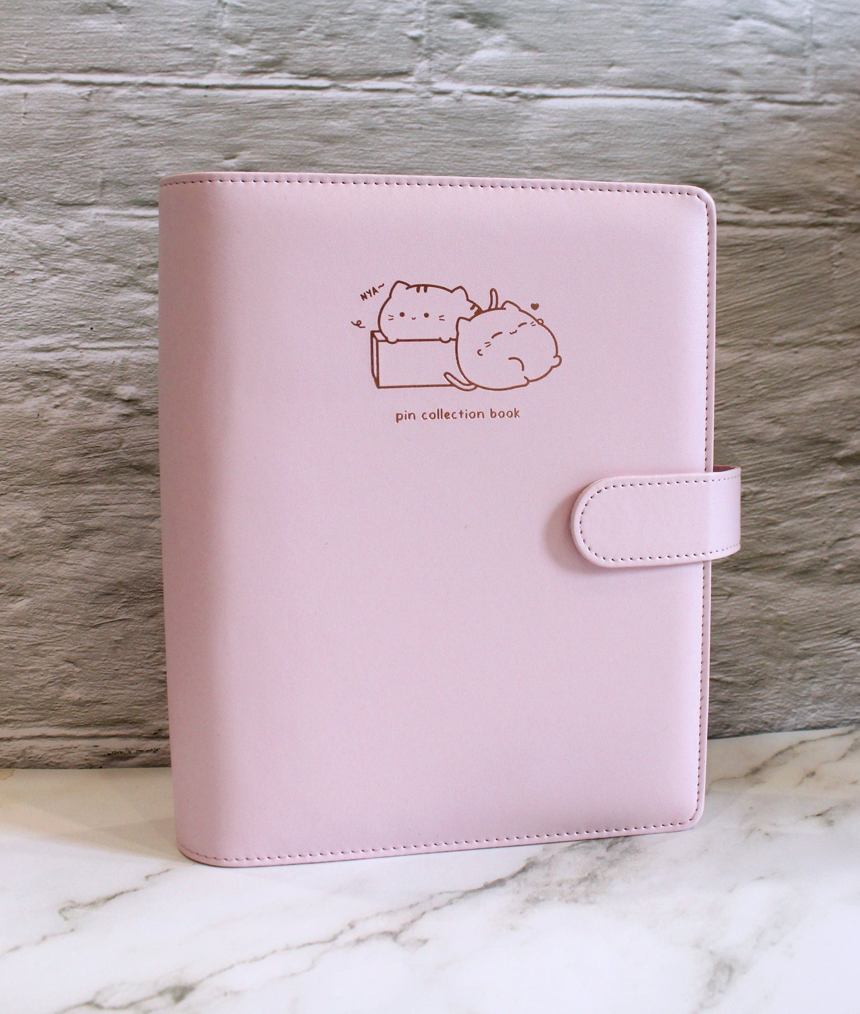 pastel pink kitty pin collection book [pickup at AnimeNYC]